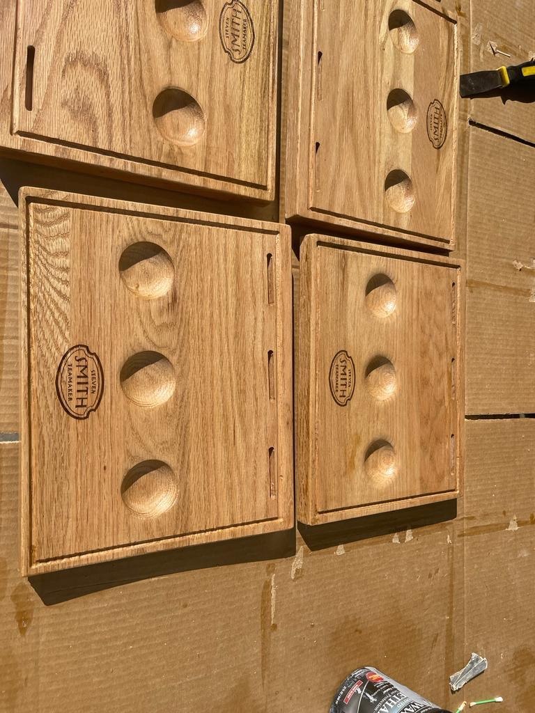 Four CNC machined branded oak tea flight boards
