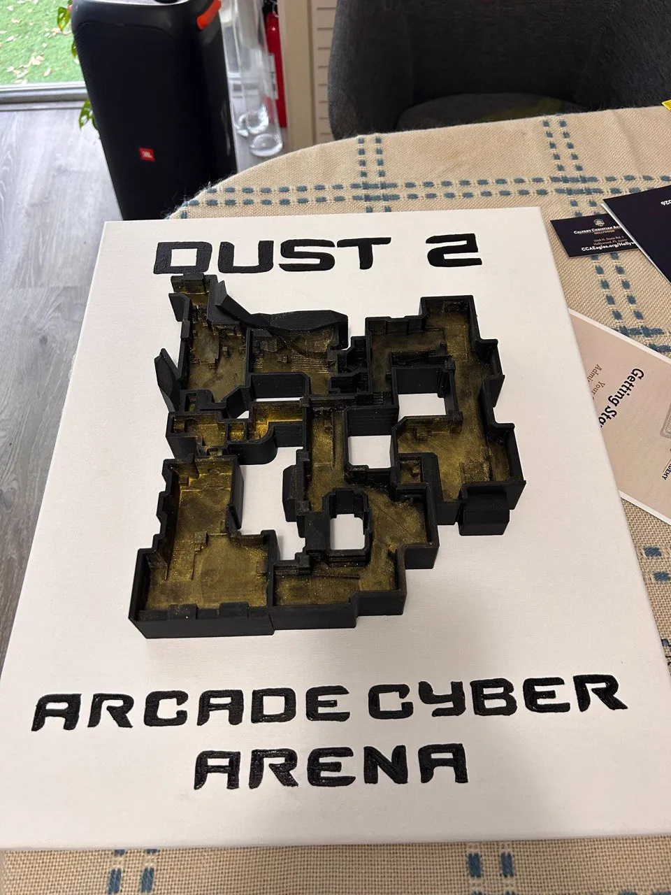 Black and gold 3D printed relief map plaque for a gaming arena