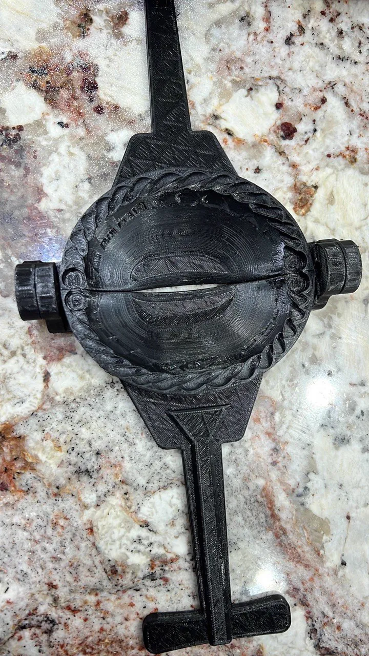 Finished 3D printed axle cover with rope-twist trim