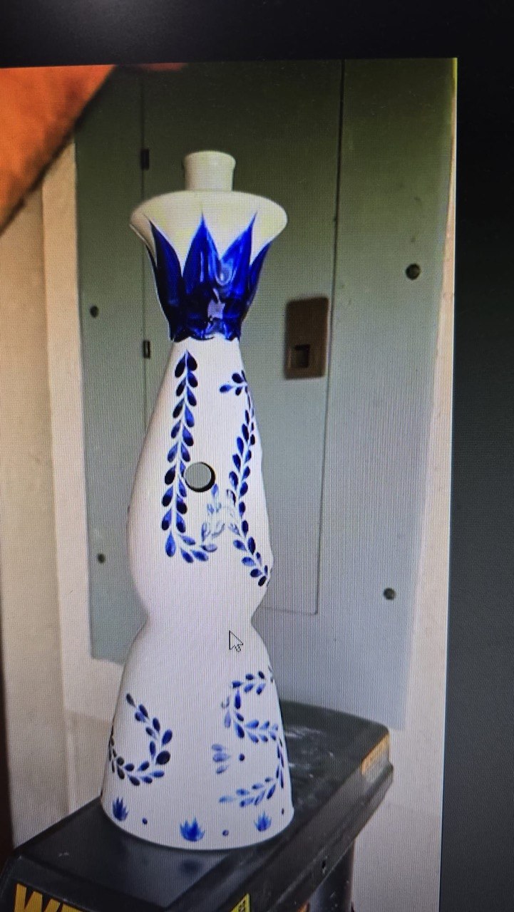 Decorative bottle after holes were drilled using the custom printed jig