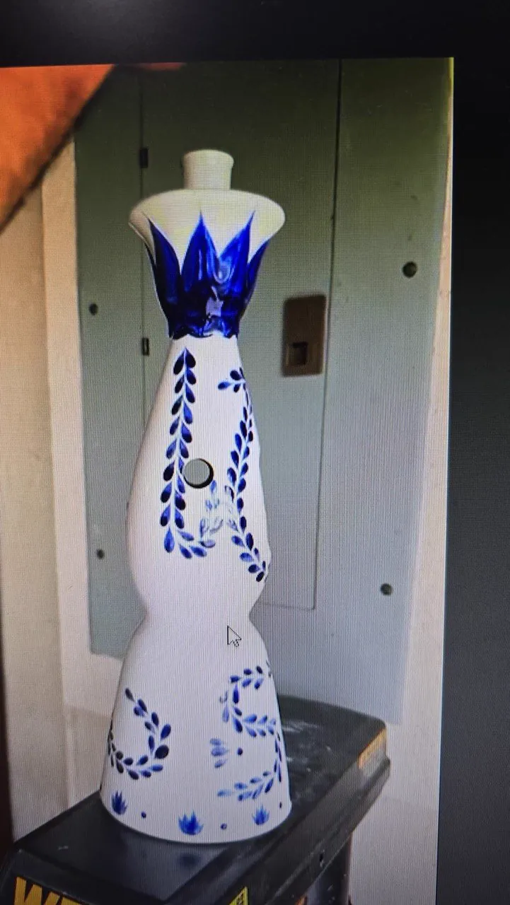Decorative bottle after holes were drilled using the custom printed jig