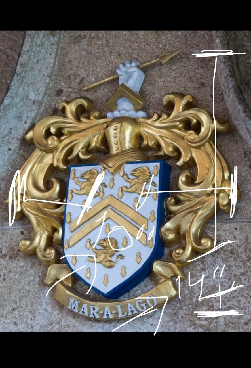 Original gilded heraldic crest photographed with handwritten measurements