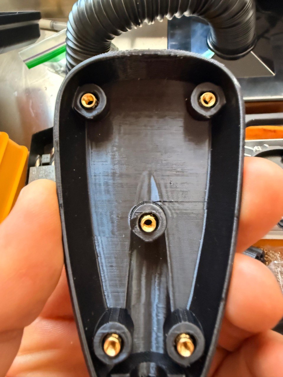 Black printed handle housing with brass heat-set threaded inserts