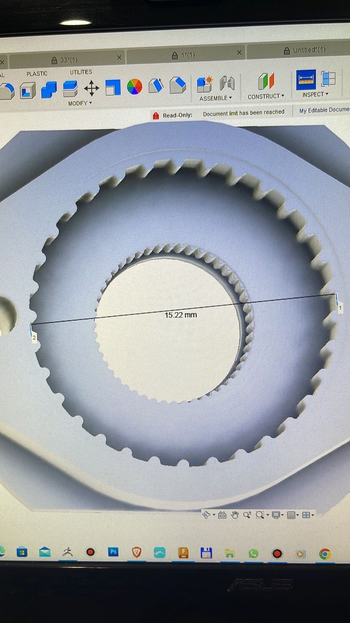 CAD inspection tool measuring a gear's diameter on screen