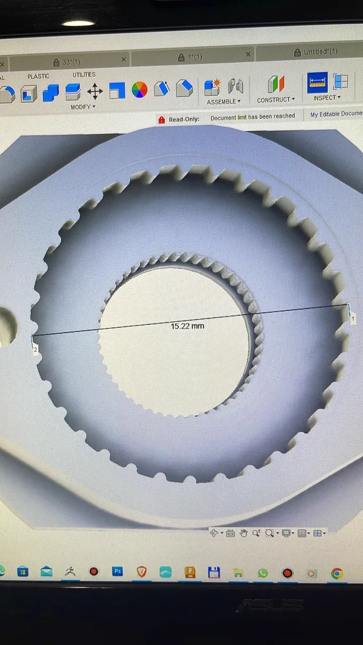 CAD inspection tool measuring a gear's diameter on screen