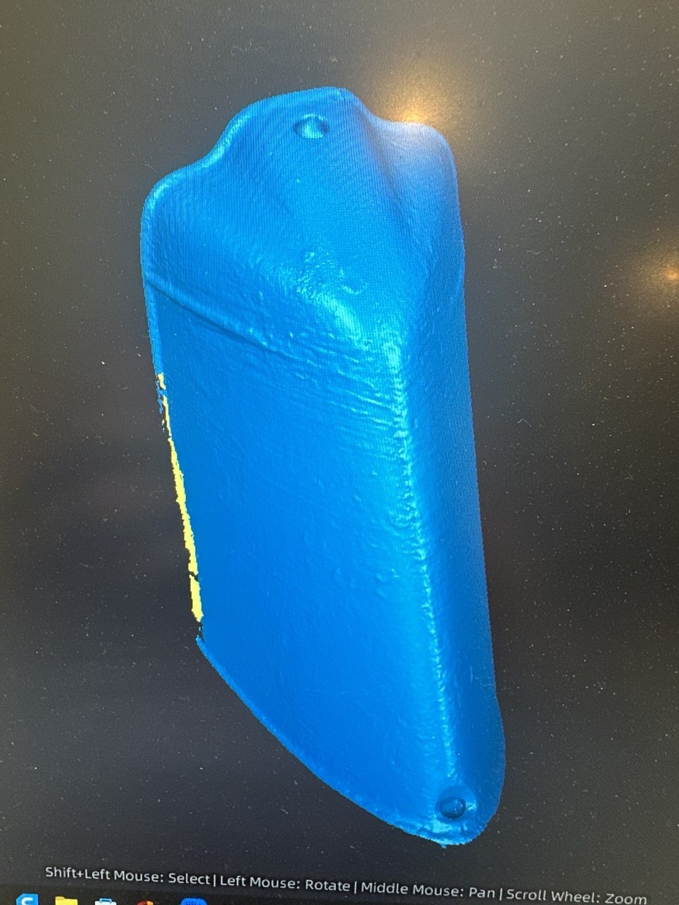 3D scan mesh of a part shown on a computer screen