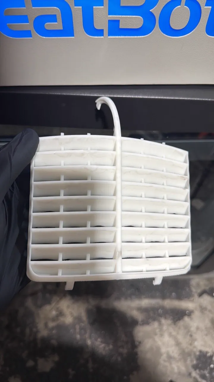 Worn plastic vent grille part being reverse engineered
